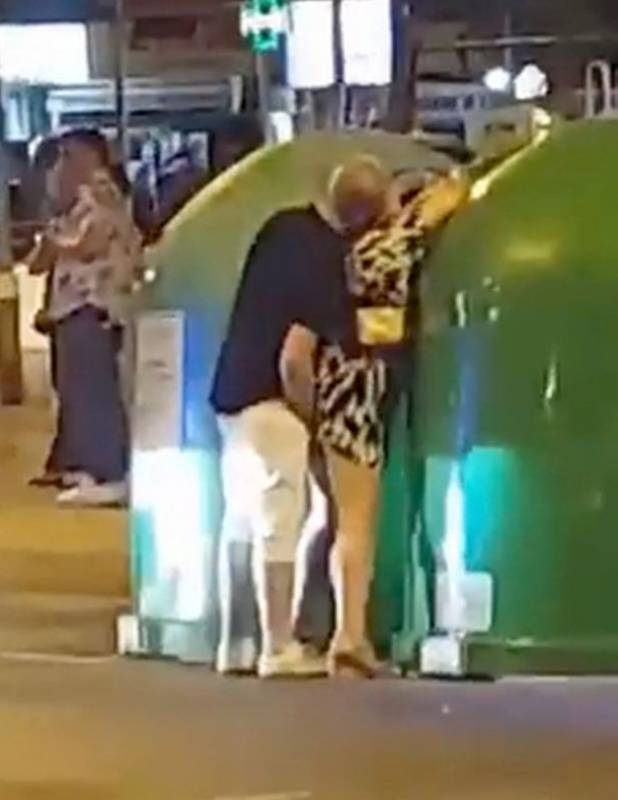 <span style='color:#780948'>ARCHIVED</span> - VIDEO: Randy Brit tourists in Benidorm have sex in the street as onlookers egg them on
